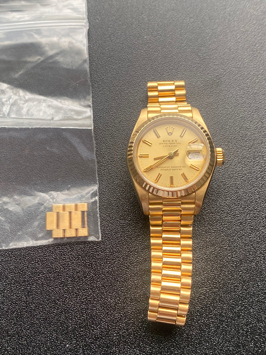 Ladies "President" 18 Kt Gold Rolex Presidential watch 26 mm model #69178, with gold-tone dial, circa 1984